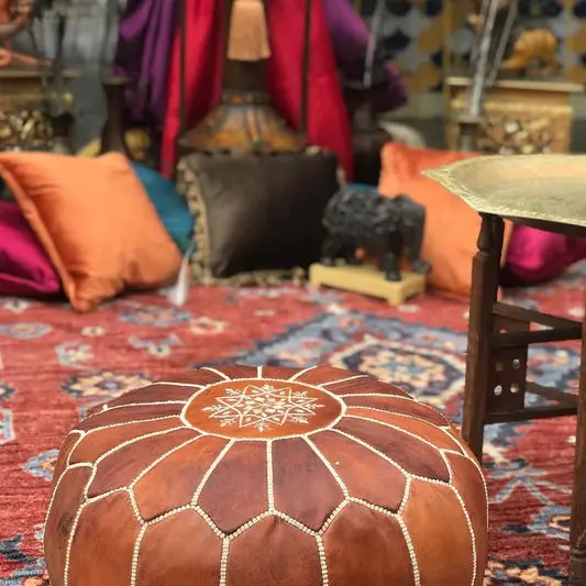 Unveiling the Timeless Charm of Moroccan Leather Poufs in Home Decor